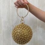 Clutch Globo Dourada